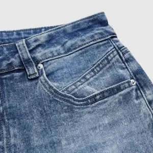 Women's classic blue denim straight jeans front waist and pocket detail main product view.