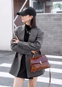 Stylish brown crocodile pattern top handle shoulder bag for women, premium leather daily tote.