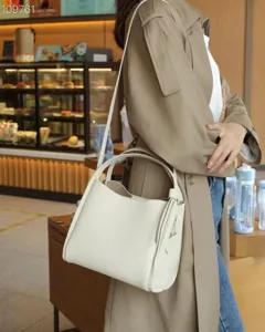 Women's genuine leather bucket bag, stylish shoulder and crossbody handbag for daily use.