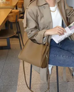 Stylish brown genuine leather shoulder bag for women, premium casual crossbody handbag view.