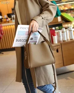 Stylish genuine leather bucket bag casual women shoulder crossbody handbag with strap.