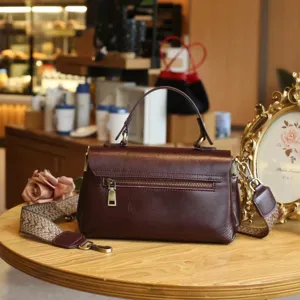 Vintage echt lederen schoudertas voor dames, bruine retro kussentas met brede schouderriem