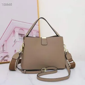 Stylish genuine leather women shoulder bag with top handle and spacious interior casual design.