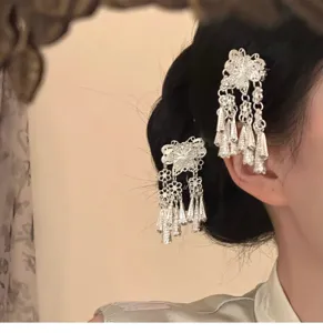 Traditional Chinese style Miao silver tassel hair clip, elegant side pin for Hanfu and outfits.