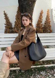 Large black leather shoulder bag for women, slouchy hobo tote bag, versatile daily handbag.