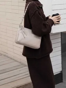 Tumbled genuine leather small shoulder bag with metal chain strap and multi-zipper pockets for women.