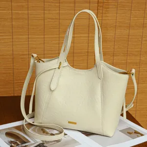 Stylish vintage women's leather tote bag, versatile shoulder and crossbody bag for daily use.