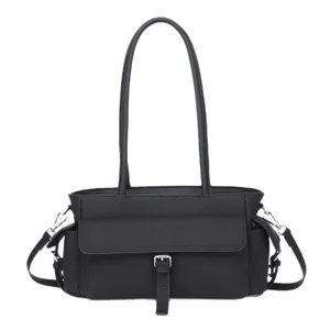 Black leather handbag for women, casual tote shoulder bag with top handle and metal buckle.