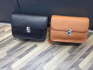 Genuine leather crossbody bag for women, classic square flap design with metal lock and strap.