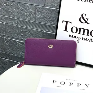 Detailed view of the purple leather long zip wallet, showcasing soft cowhide and card slots.