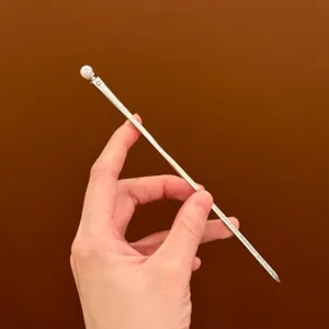 Elegant Chinese style pearl hair stick, minimalist metal hairpin for versatile daily styling.