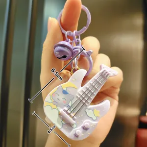 Cute cartoon cat guitar keychain mini music toy with bell, purple bag pendant and accessories.