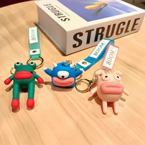 Close-up of cute cartoon sausage mouth keychains set, funny silicone doll bag pendant.