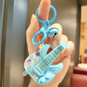 Blue cartoon guitar keychain cute music toy pendant for car keys and bags stylish accessory