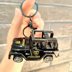 Mini coche de policía jeep llavero juguete, colgante de anillo de llave de fricción.