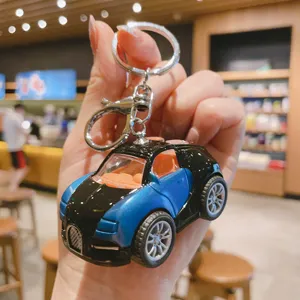 Mini portachiavi auto a carica in lega, anello in metallo, simpatico modello regalo.