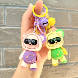 Niedlicher Cartoon Bären Schlüsselanhänger mit Sonnenbrille und lächelndem Gesicht für Taschen.