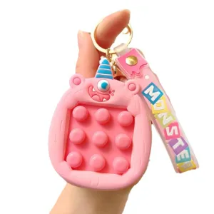 Süßer Cartoon Monster Push Pop Blase Schlüsselanhänger Silikon Tasche Anhänger Spielzeug