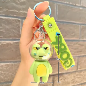 Cute cartoon space frog keychain with transparent helmet design, perfect bag pendant gift.