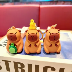 Cute cartoon capybara keychain plush doll bag pendant, funny animal key ring for car keys.