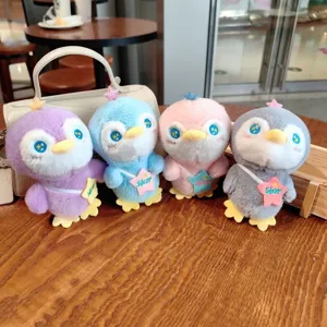Set di simpatici peluche pinguini di cartoni animati con borse a stella, portachiavi.