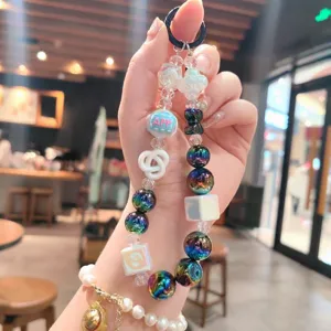 Creative acrylic beaded keychain and bag charm with colorful rainbow beads for women daily accessory.