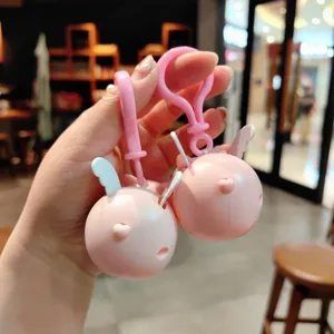 Simpatico portachiavi maialino volante rosa con piccole ali, ciondolo borsa cartone animato.