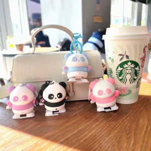 Süßer Aufzieh-Panda-Schlüsselanhänger niedliche Puppen Tasche Anhänger Detailansicht.