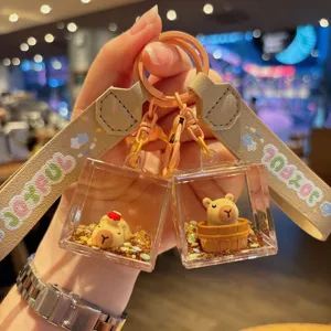 Cute capybara liquid keychain acrylic quicksand bag pendant lovely gift keyring for kids.