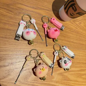 Cute cartoon animal keychain featuring nail clipper and ear pick, perfect bag pendant gift.