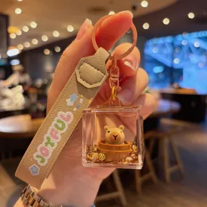 Cute capybara quicksand acrylic keychain detail, oil filled pendant bag charm accessory