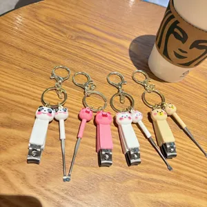 Cute cartoon animal nail clipper keychain with ear spoon, portable cute bag pendant gift.