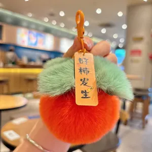 Llavero de peluche de caqui lindo detalle, colgante de fruta naranja esponjosa con hojas verdes.