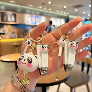 Cute cartoon panda nail clipper keychain with ear pick, lovely bag pendant and practical key chain.