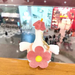 Cute plush goose keychain with flower backpack, soft stuffed animal bag pendant charm.