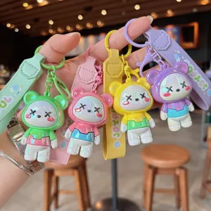 Cute electroplated cartoon bear keychain bag pendant with colorful strap accessories for keys.