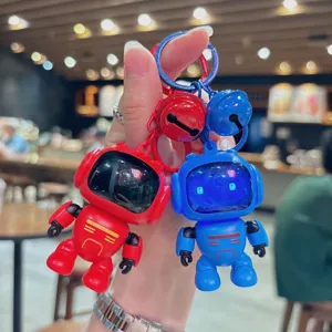 Llavero de robot luminoso lindo, colgante de bolsa de luz nocturna LED creativa para llaves de auto.