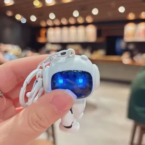 Bonito robot astronauta llavero con luz nocturna brillante colgante de bolsa regalo
