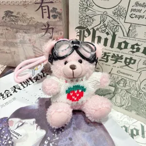 Mignon porte-clés en peluche rose avec lunettes d'aviateur et pull fraise pendentif de sac.