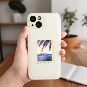 White leather phone case with retro vaporwave beach stamp design, elegant protective cover.