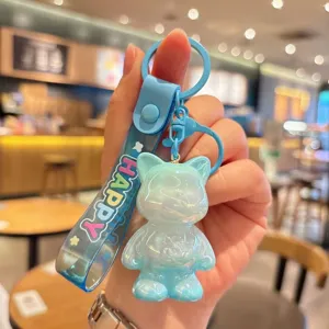 Blue electroplated cat acrylic keychain pendant, cute cartoon animal bag charm accessory.