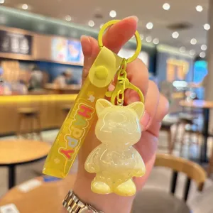 Cute yellow acrylic cat keychain with strap, sweet cartoon bag pendant and accessory.