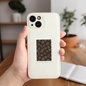 Detailed view of a vintage style stamp sticker with retro circle pattern on white phone case.