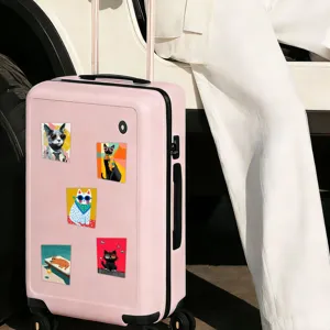 Detailed view of colorful cat stickers decorated on a pink suitcase, lifestyle shot.