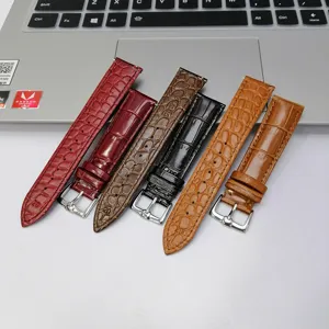 Correa de reloj de cuero genuino con pasadores de liberación rápida y hebilla brillante.