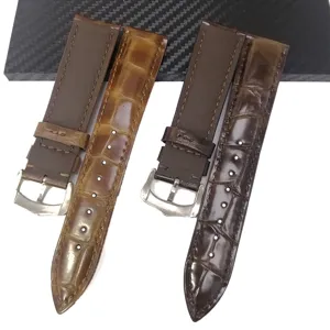 Bracelet de montre en cuir véritable avec motif croco et boucle en acier, doux et résistant.