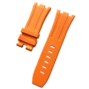 Correa de reloj de caucho fluorado naranja, detalle de superficie texturizada.
