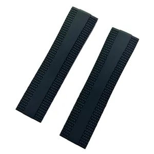 Black rubber watch strap replacement 22mm textured silicone watch band closeup detail view