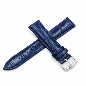 Correa de reloj de cuero genuino azul con patrón de cocodrillo, pasador rápido y hebilla plateada.