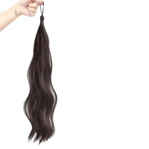 Golvende haar knot extension donkerbruin haarstuk voor stijlvolle en chique kapsels.